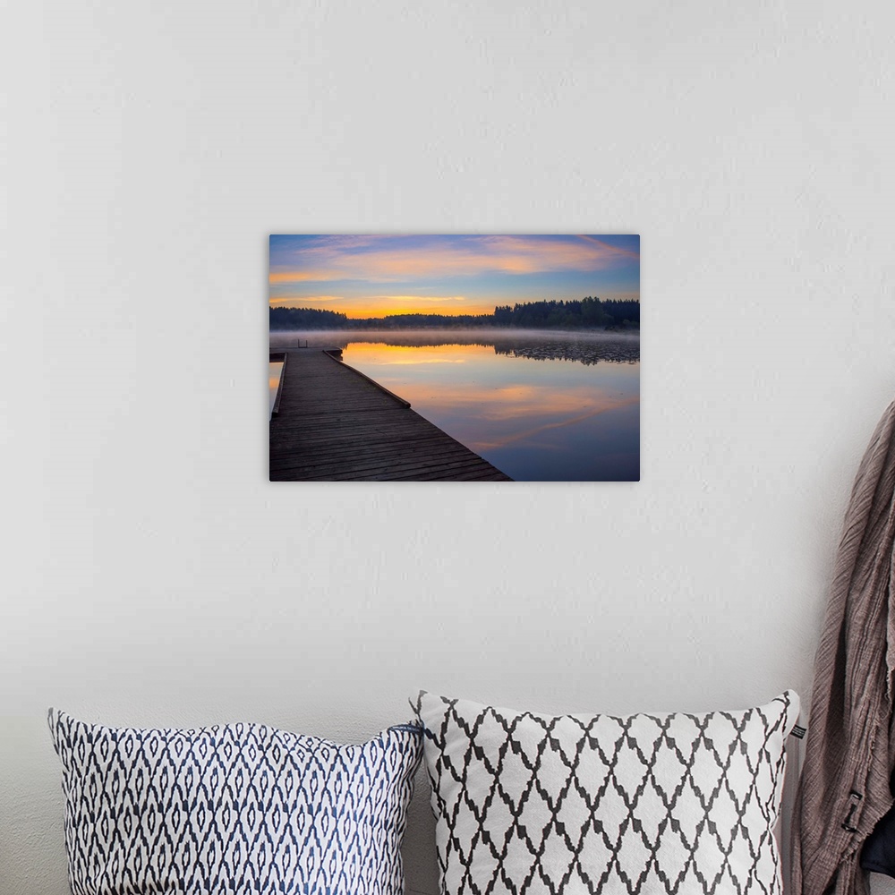 A bohemian room featuring Reflection of a beautiful serene sunrise on peaceful Scott lake, Washington, United States of Ame...