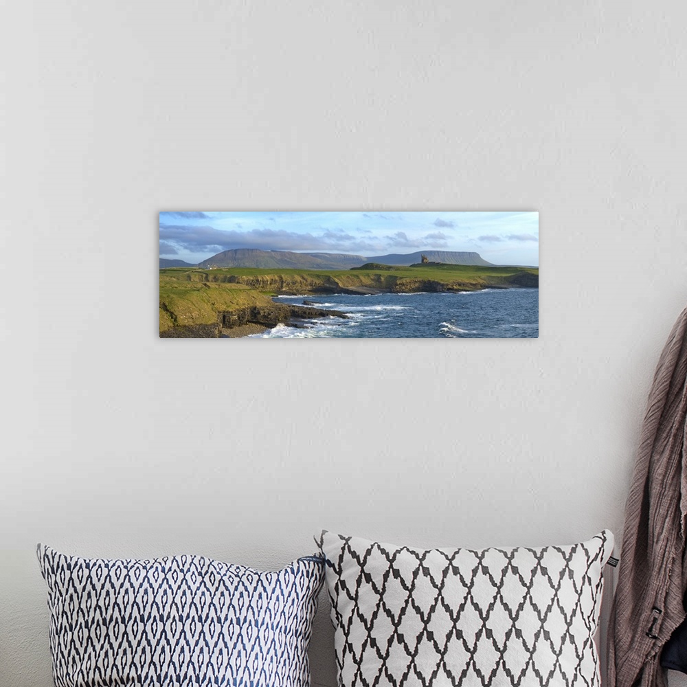 A bohemian room featuring Rugged Coastline with Classiebawn Castle, Mullaghmore, County Sligo, Ireland