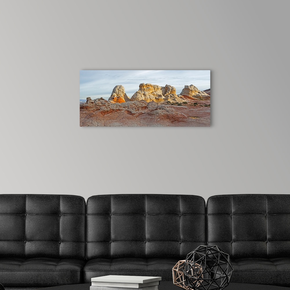 A modern room featuring Rugged rock formations in the early morning; White Pocket, Utah, United States of America