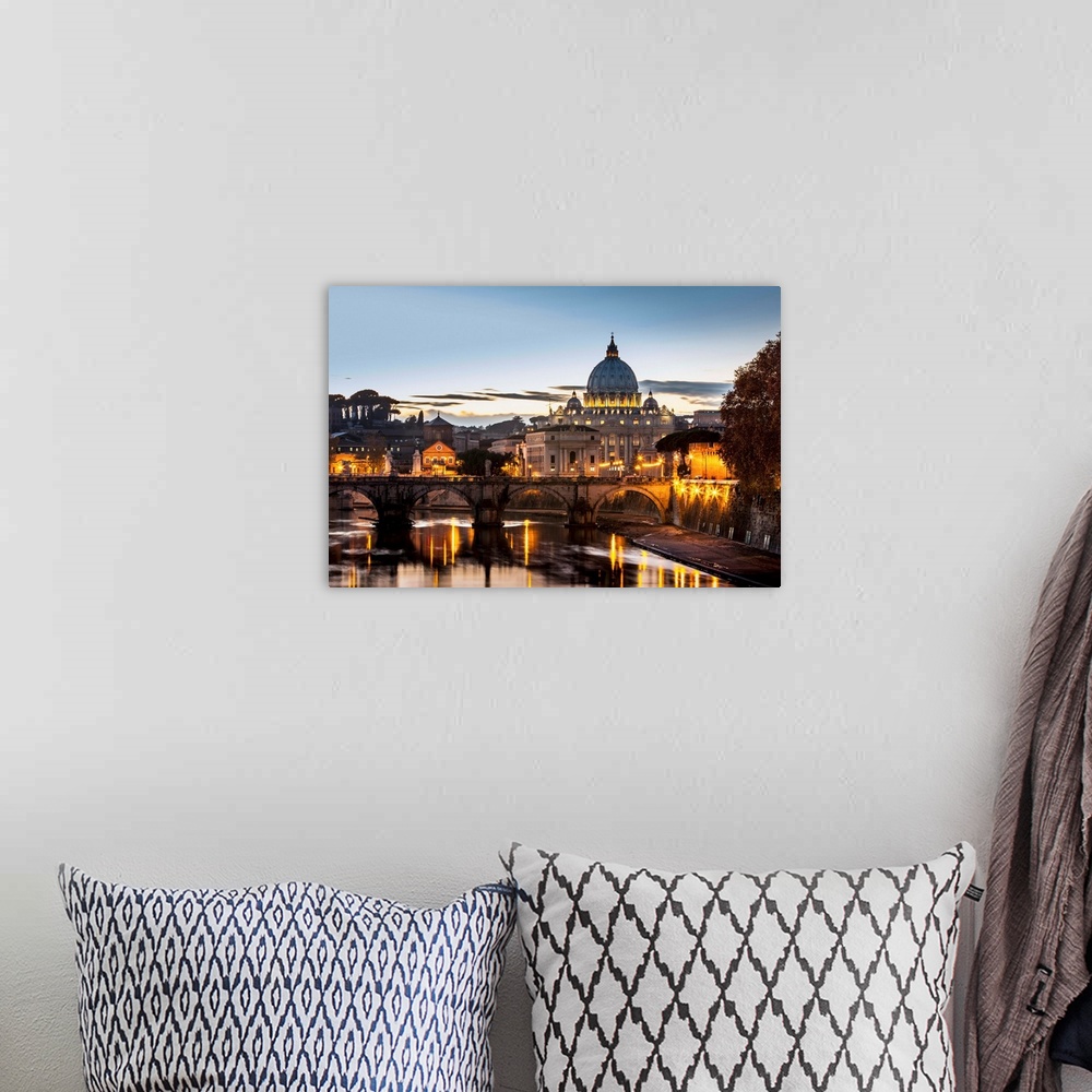 A bohemian room featuring Saint Peter's Basilica, the world's largest church, at sunset. Vatican City, Italy.