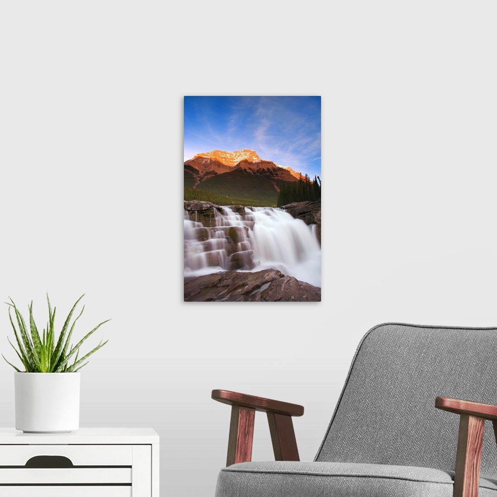 A modern room featuring Scenic Mountain Waterfall