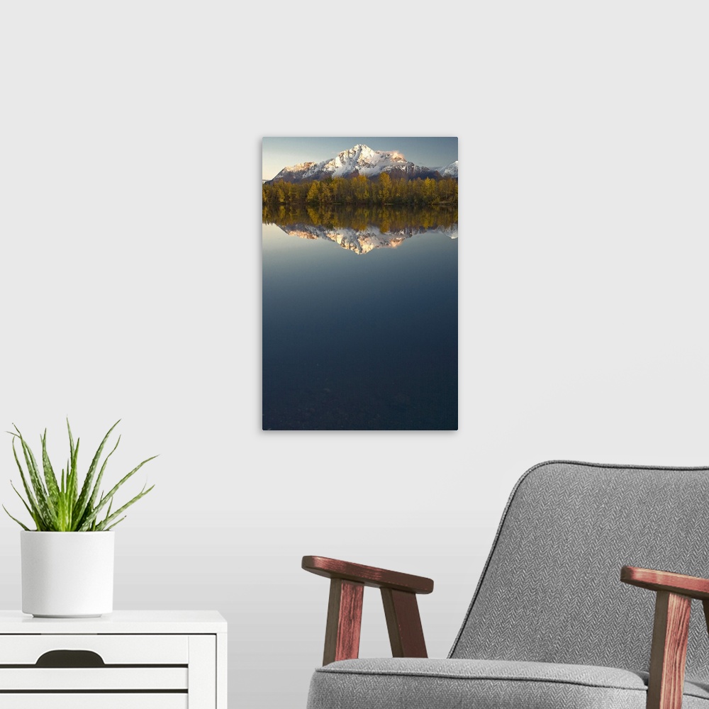 A modern room featuring Scenic view of Pioneer Peak reflecting in Echo Lake at sunset, Southcentral, Alaska