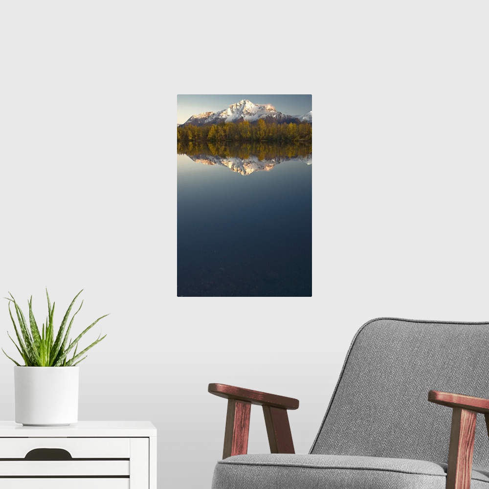 A modern room featuring Scenic view of Pioneer Peak reflecting in Echo Lake at sunset, Southcentral, Alaska
