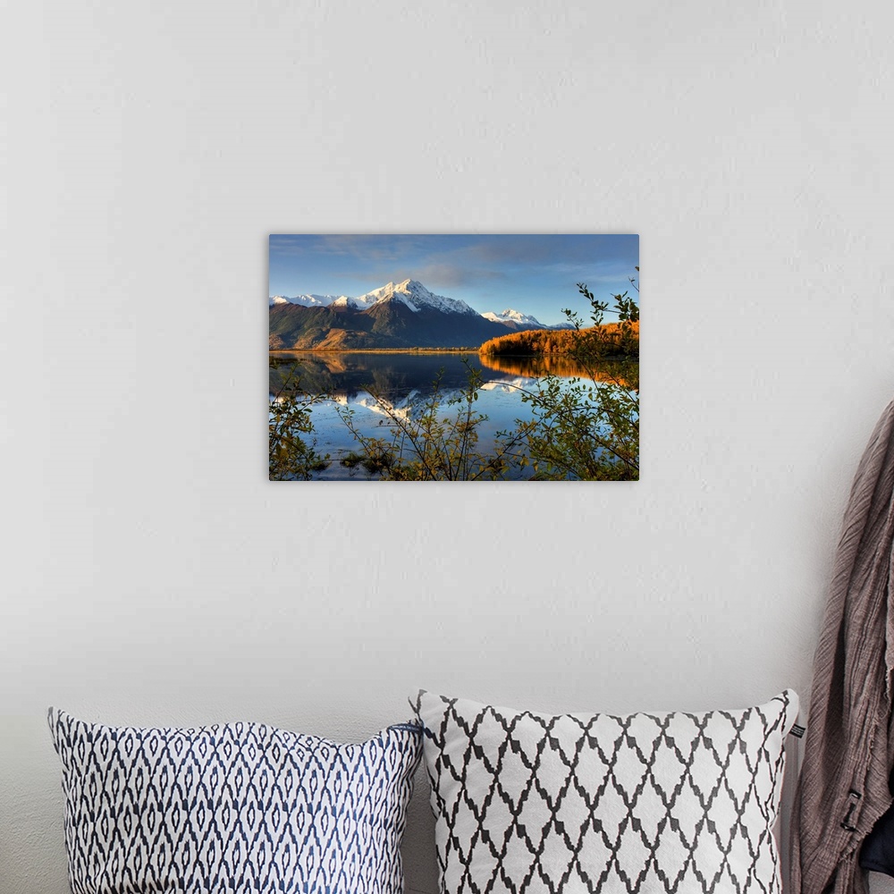 A bohemian room featuring Scenic view of Pioneer Peak reflecting in Jim Lake in Mat Su Valley, Alaska
