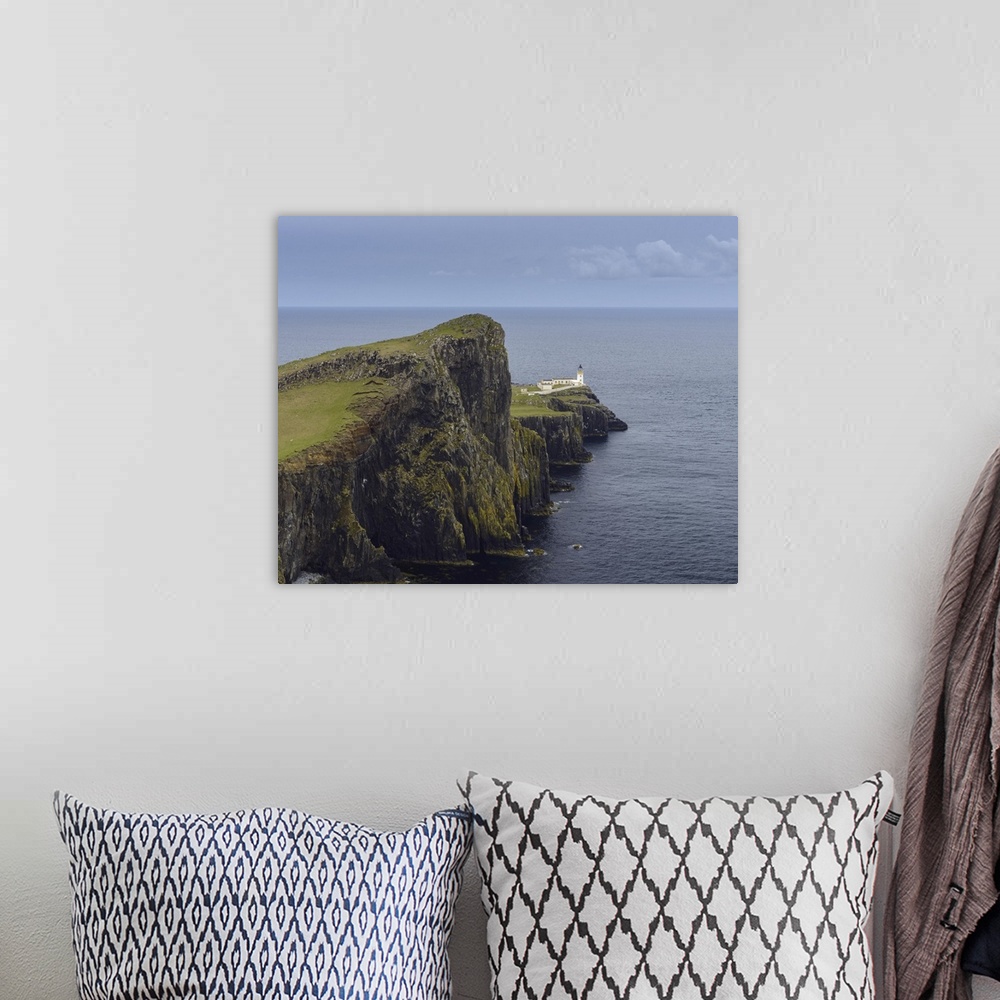 A bohemian room featuring Scottish coast with Neist Point Lighthouse on the Isle of Skye in Scotland, UK