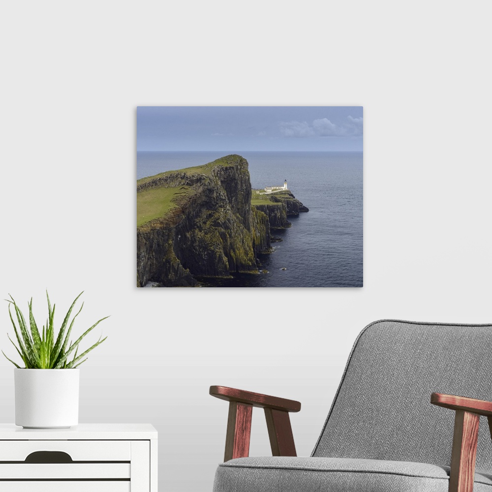 A modern room featuring Scottish coast with Neist Point Lighthouse on the Isle of Skye in Scotland, UK