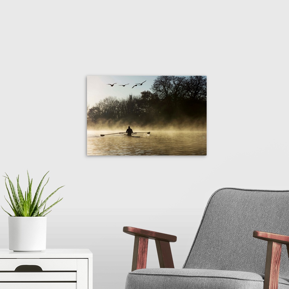 A modern room featuring Sculling in mist on River Thames, London, England