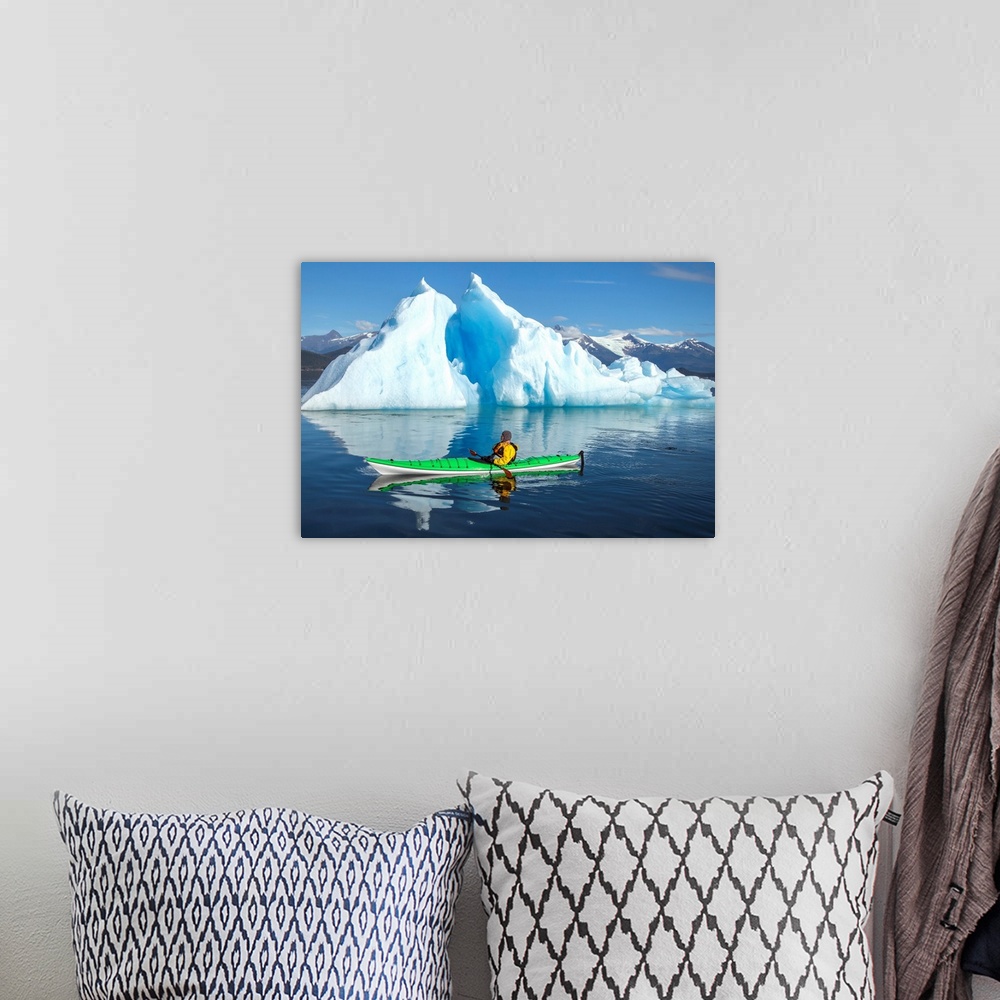 A bohemian room featuring Sea Kayaker Paddles Beside An Iceberg, Alaska