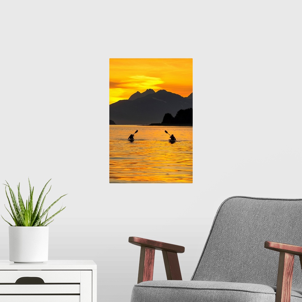A modern room featuring Sea Kayaking on a sublime evening in Lynn Canal near Eagle Beach State Recreation Area, Juneau, A...