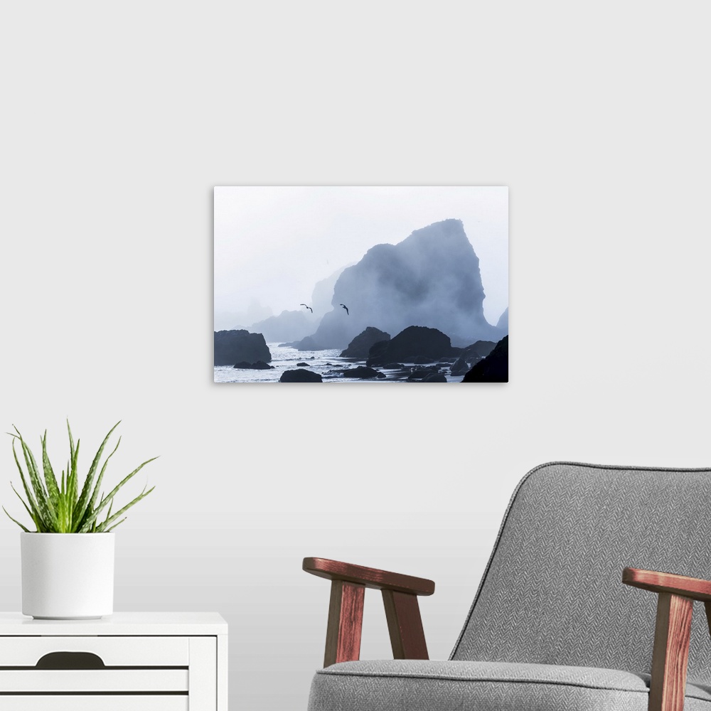 A modern room featuring Sea stacks are silhouetted against fog at Ecola state park, cannon beach, Oregon, united states o...