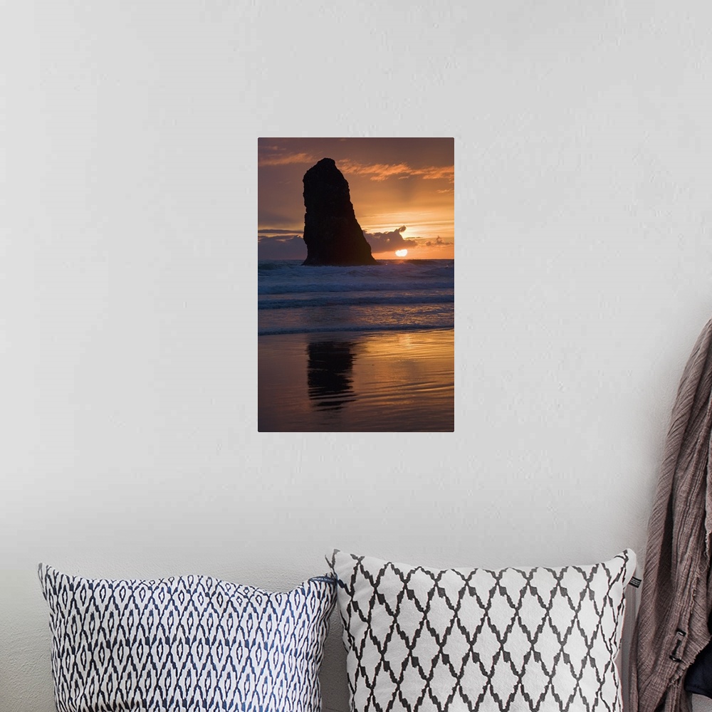 A bohemian room featuring Silhouette Of A Rock Formation At Sunset; Cannon Beach, Oregon, USA