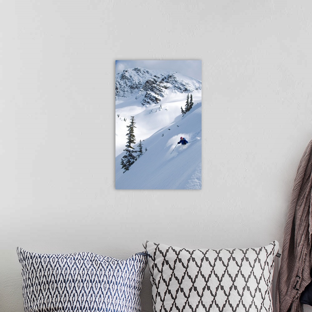 A bohemian room featuring Skier Hitting Powder Below Nak Peak, Cascade Mountains, BC, Canada
