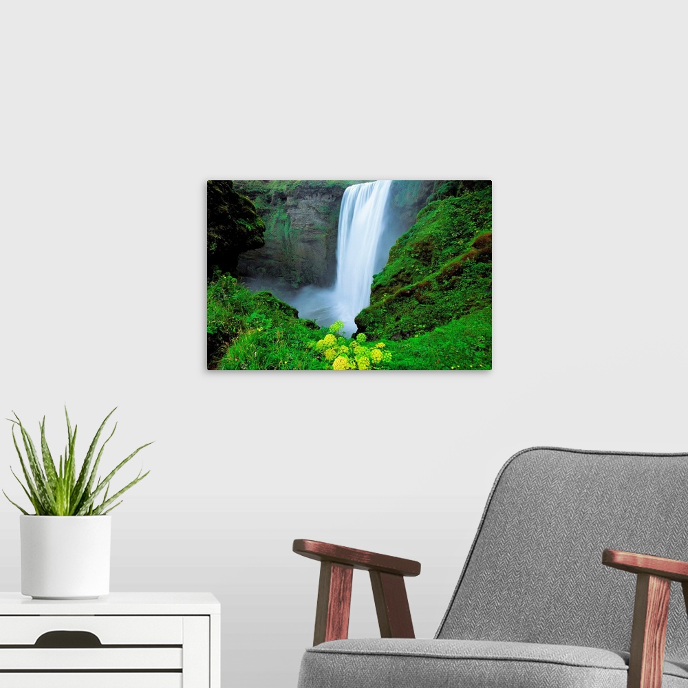 A modern room featuring Skogafoss Waterfall, Southern Iceland