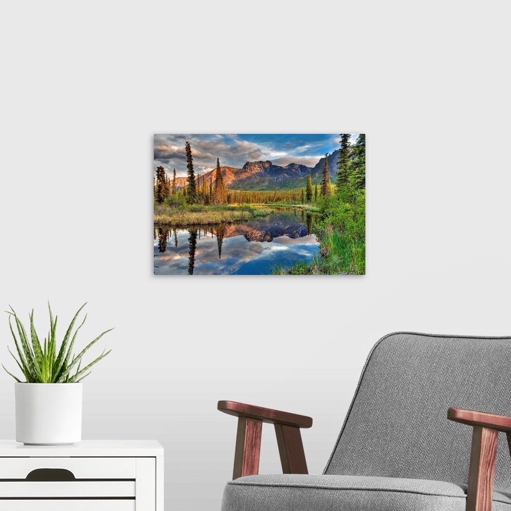 A modern room featuring Skookum Volcano reflecting in a pond along the Nabesna Road in Wrangell-St. Elias National Park a...