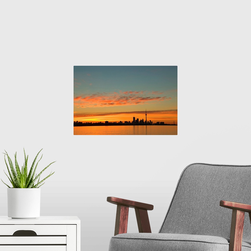 A modern room featuring Skyline Of Toronto Against A Beautiful Sunset