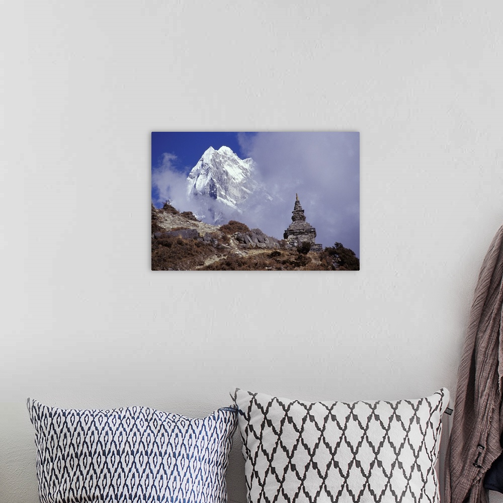 A bohemian room featuring Snow Covered Peak With Nepalese Monument