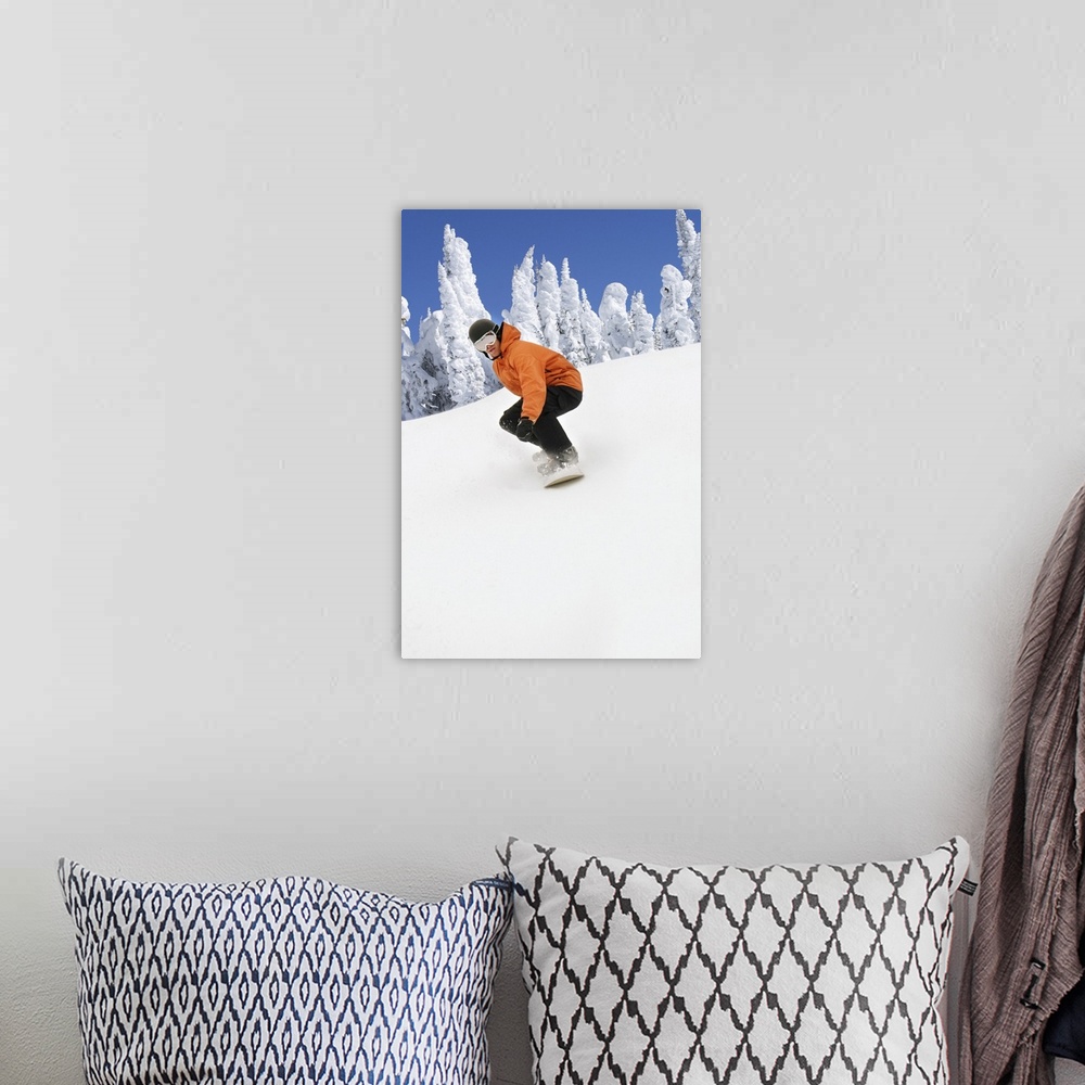 A bohemian room featuring Snowboarder Going Down Snowy Hill