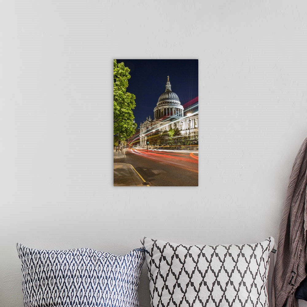 A bohemian room featuring St Pauls Cathedral floodlit at night.
