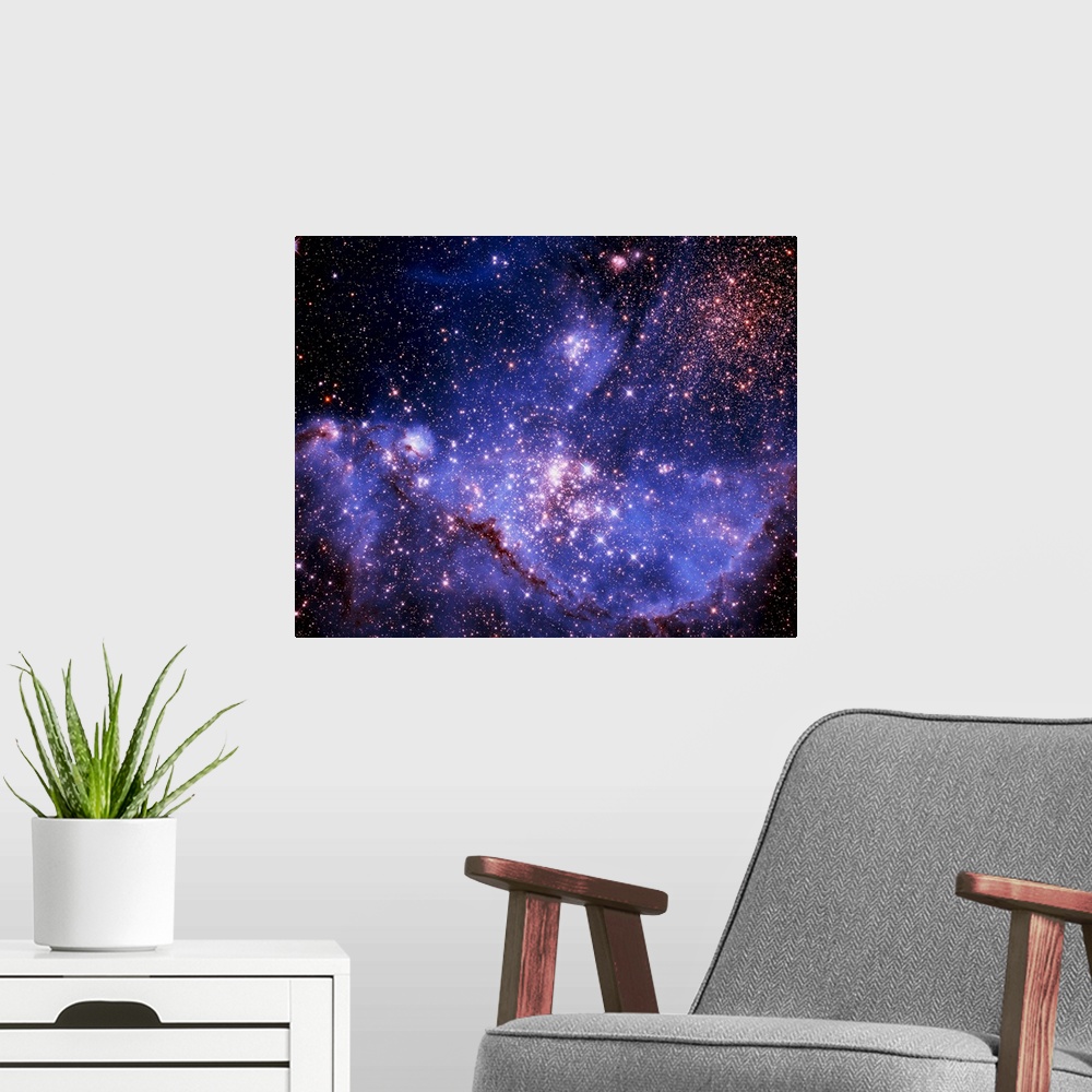 A modern room featuring Photograph of colorful clouds and bright stars in the cosmos. Product does not include actual lig...