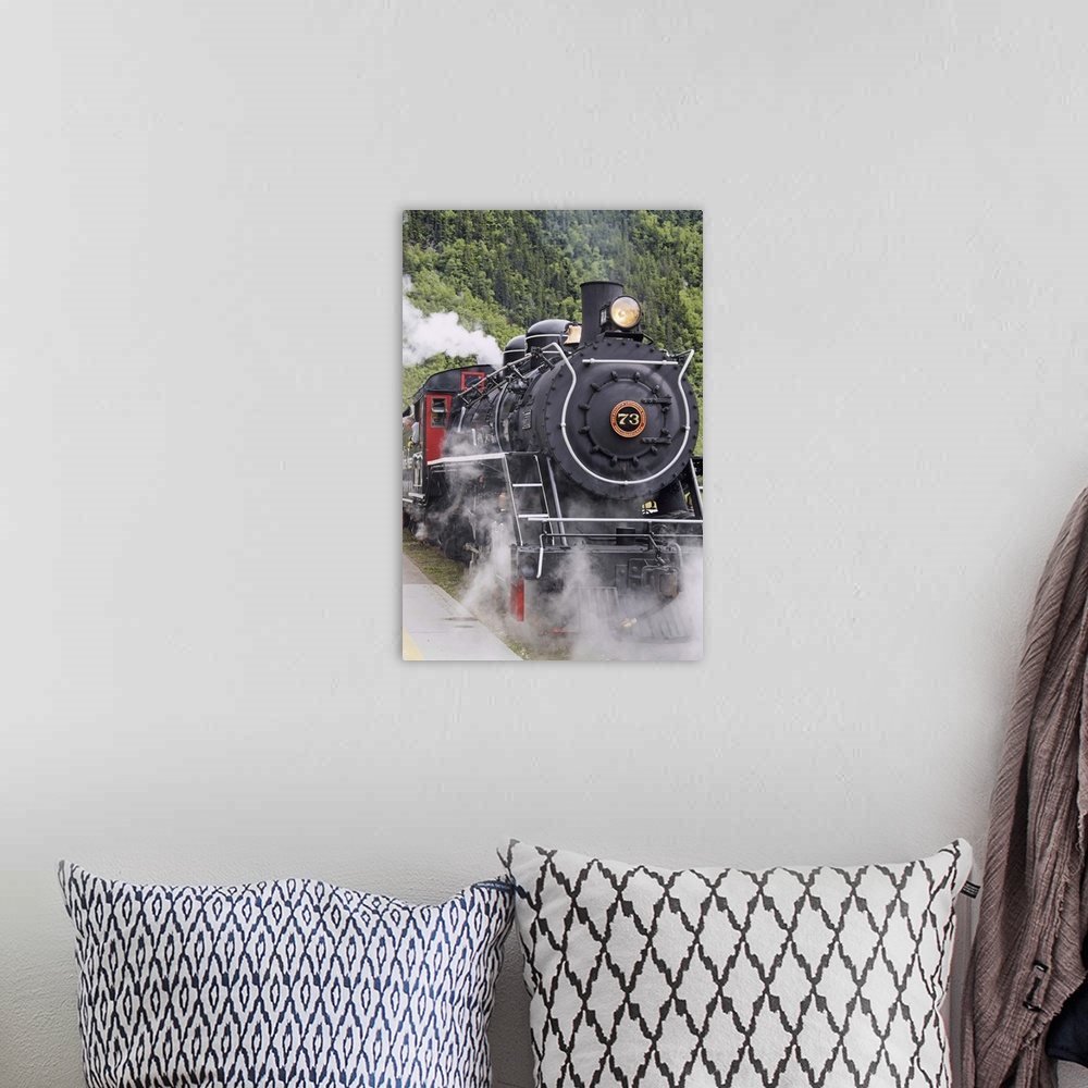 A bohemian room featuring Steam locomotive 73 at downtown depot of White Pass and Yukon Route RR in Skagway, Alaska. Narrow...