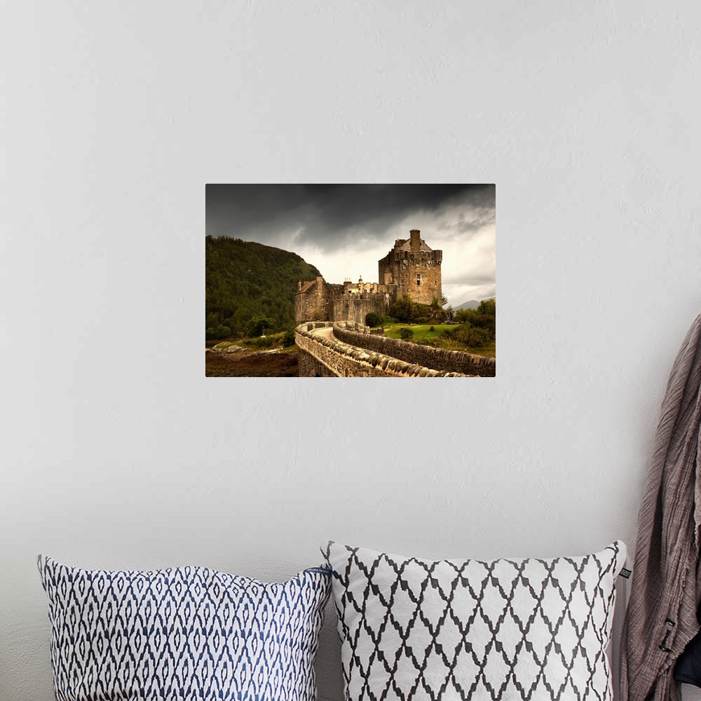 A bohemian room featuring Stone Bridge Leading To A Castle Under A Stormy Sky. Kyle Of Lochalsh Highlands Scotland.