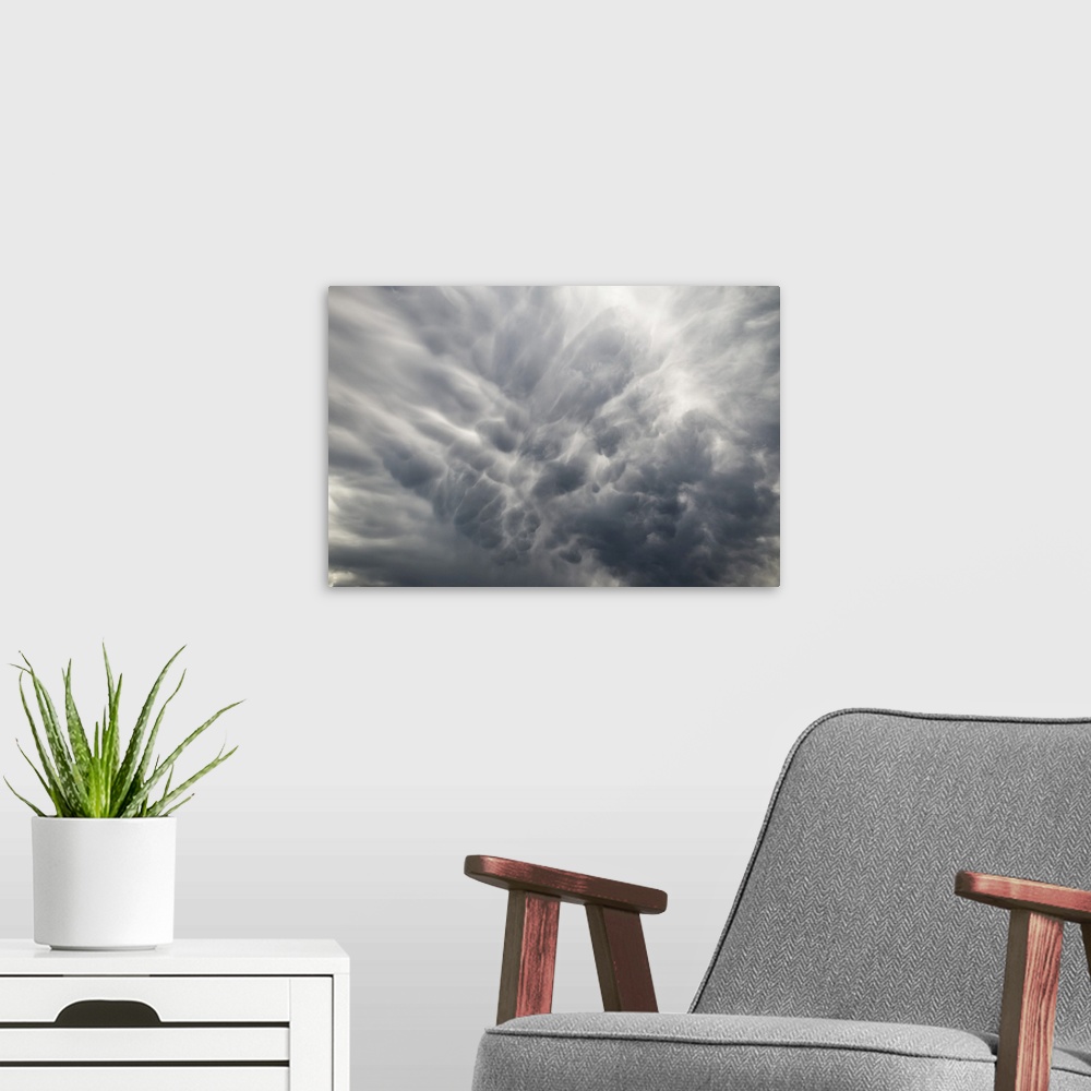 A modern room featuring Storm clouds during a warning of tornadoes and hailstorms, Loveland, Colorado, united states of A...