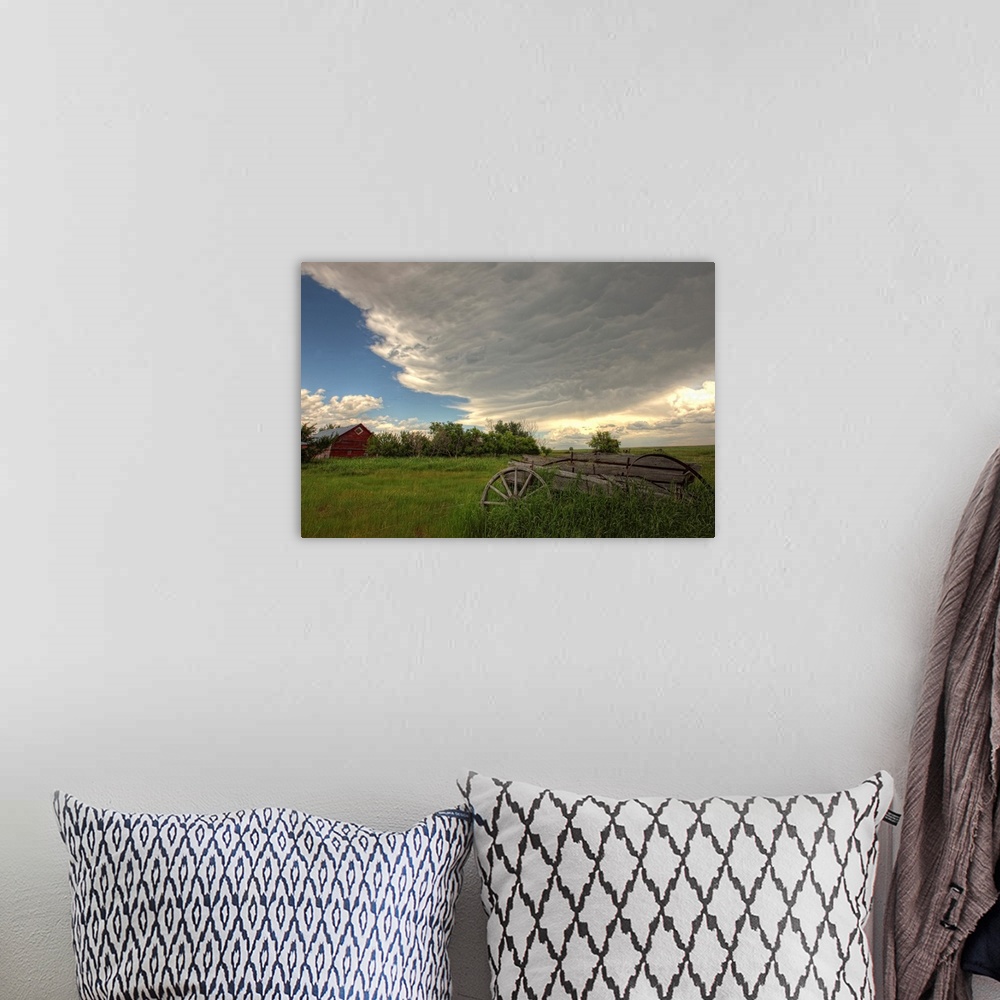 A bohemian room featuring Storm Clouds Gather Over An Abandoned Farm, Saskatchewan, Canada