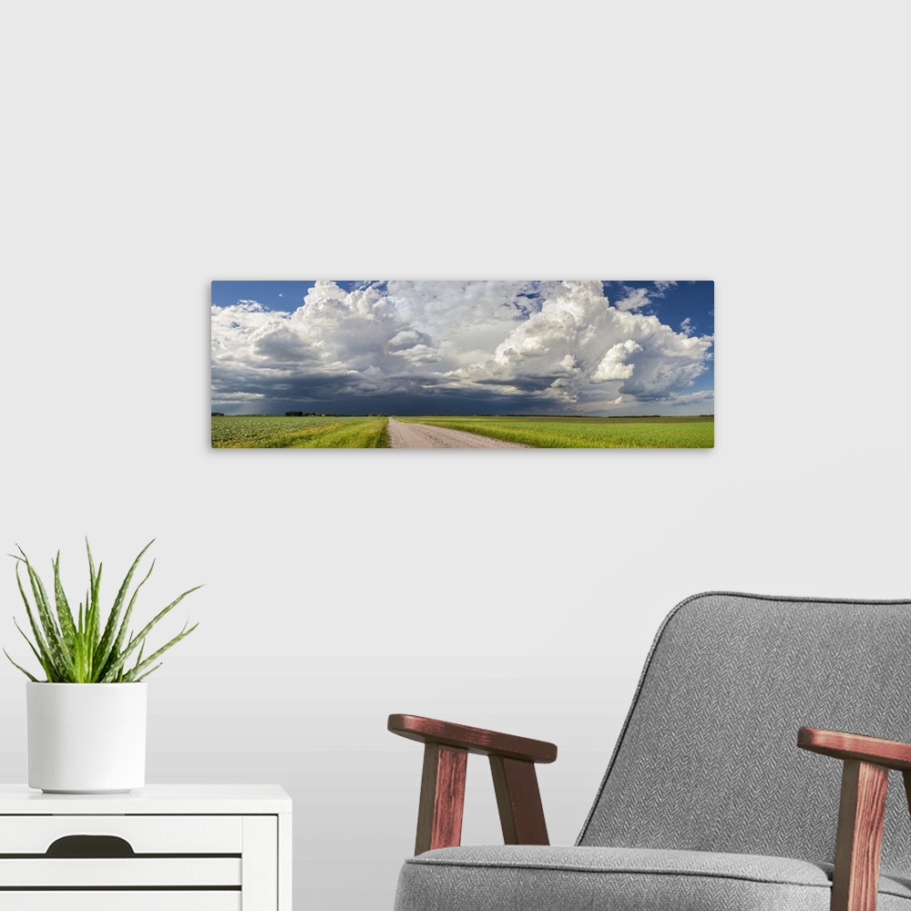 A modern room featuring Storm clouds over the prairies. Winnipeg, Manitoba, Canada.