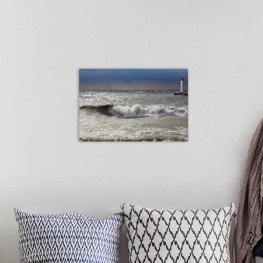 A bohemian room featuring Storm waves crashing on a beach near a lighthouse on Lake Ontario, Whitby, Ontario