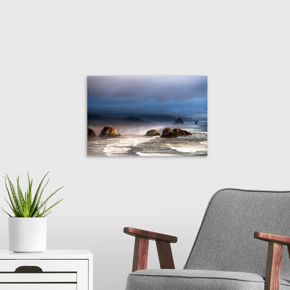A modern room featuring Sunlight and mist create coastal moods. Cannon Beach, Oregon, United States of America.