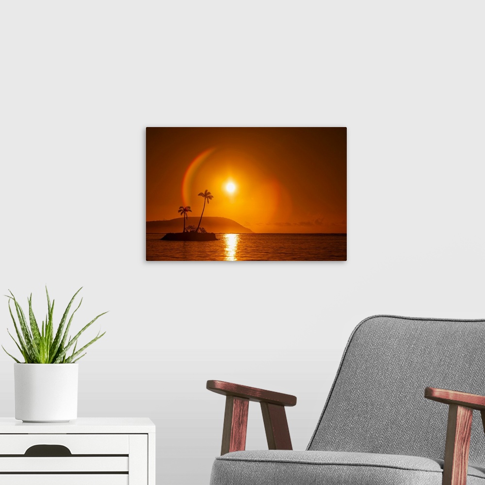 A modern room featuring Sunrise at Kahala Beach, Waialae Beach Park, with a flare around the sun in a glowing red sky ref...