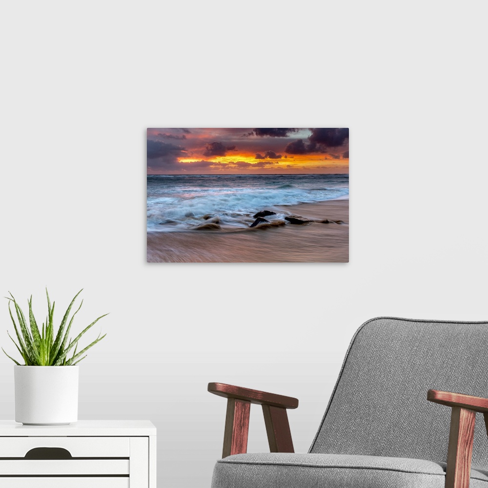 A modern room featuring Sunrise on the Hawaiian shore, Lydgate Beach; Kapaa, Kauai, Hawaii, United States of America.