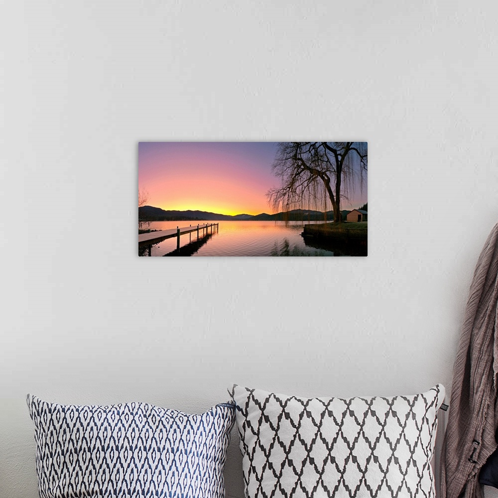 A bohemian room featuring Photograph of pier stretching into the water at early morning with mountains in the distance.  Th...