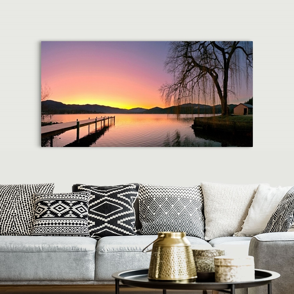 A bohemian room featuring Photograph of pier stretching into the water at early morning with mountains in the distance.  Th...