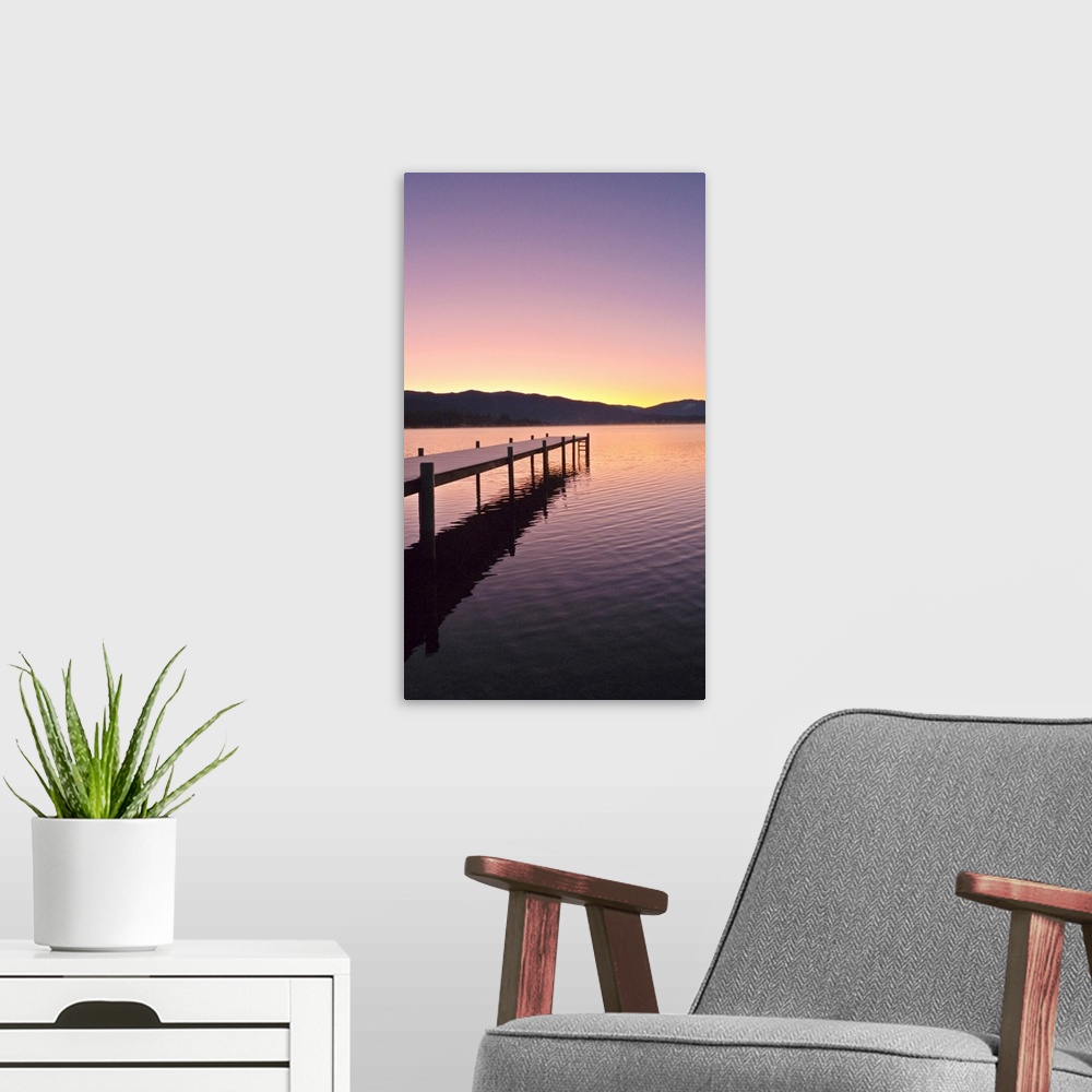 A modern room featuring Sunrise over a dock in Lake Whatcom during Winter, Bellingham Washington, USA