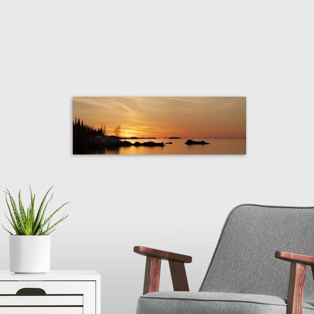 A modern room featuring Sunrise Over Lake Superior; Ontario, Canada