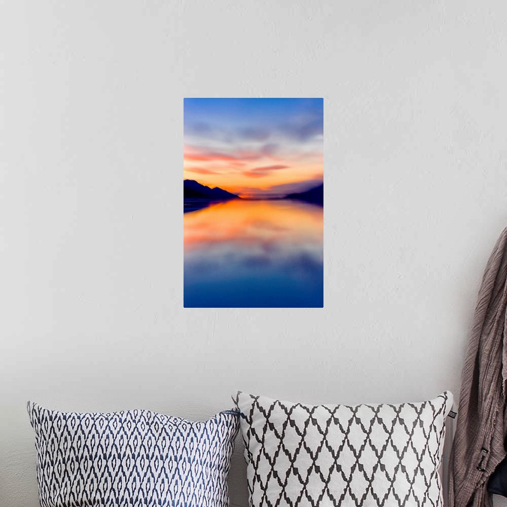 A bohemian room featuring Sunset colors reflected in the waters of Turnagain Arm