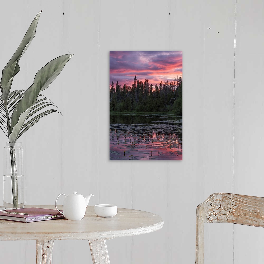 A farmhouse room featuring Sunset over a small beaver pond along the Yellowhead Highway near Smithers, Canada