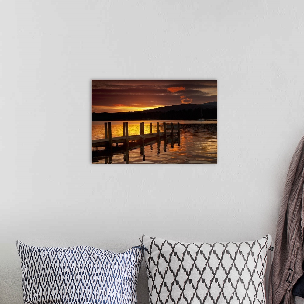 A bohemian room featuring Sunset Over Dock At Lake Windermere; Ambleside, Cumbria, England