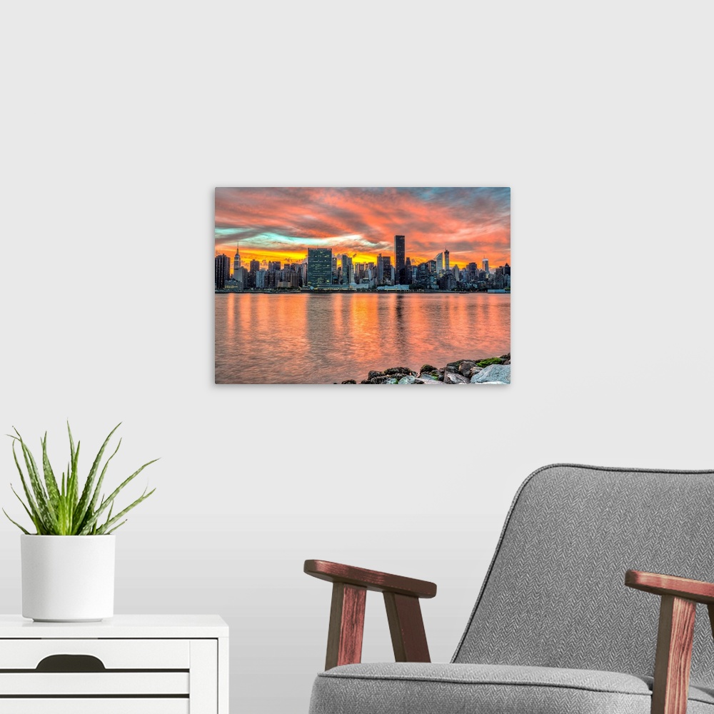 A modern room featuring Sunset over Manhattan, Gantry Plaza, Long Island City, New York