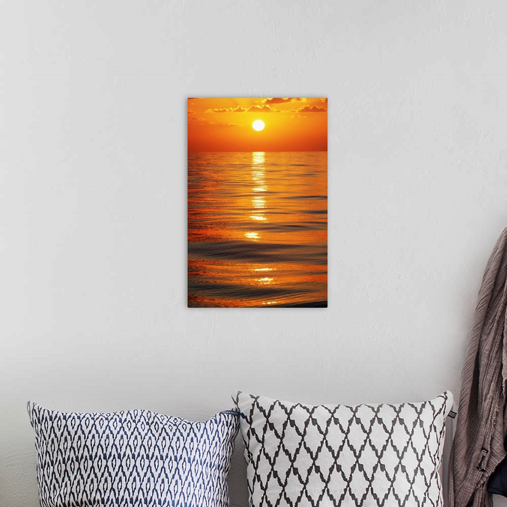A bohemian room featuring Sunset Over Ocean Horizon
