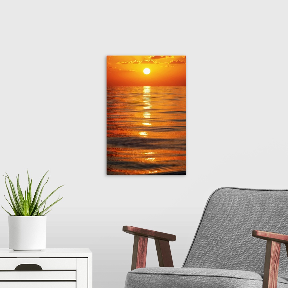 A modern room featuring Sunset Over Ocean Horizon
