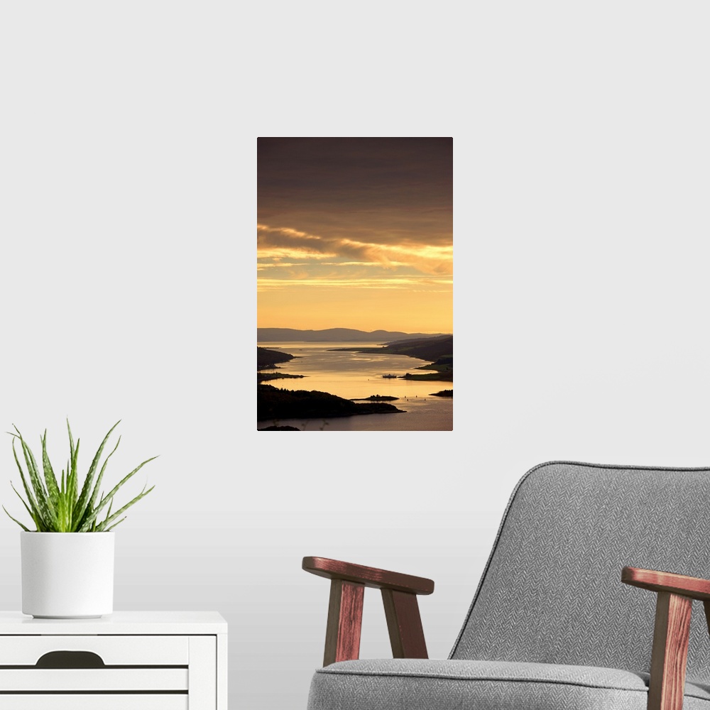 A modern room featuring Sunset Over Water, Argyll And Bute, Scotland, UK
