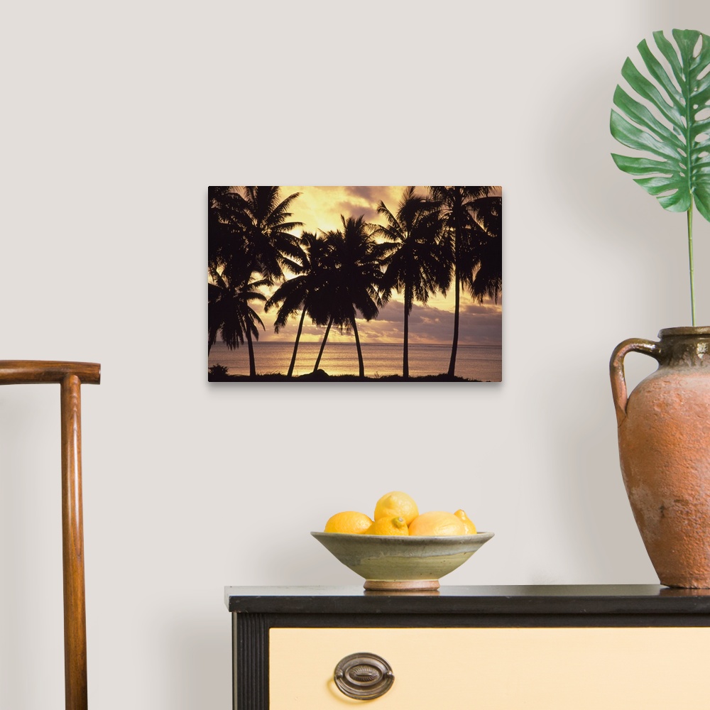 A traditional room featuring Sunset (Palm Trees In Silhouette), Aitutaki, Cook Islands