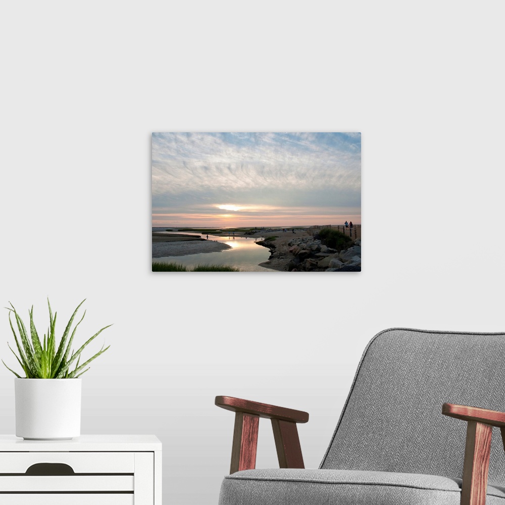 A modern room featuring Sunset view of Payne's Creek and ocean on Cape Cod.