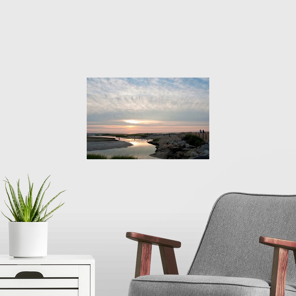 A modern room featuring Sunset view of Payne's Creek and ocean on Cape Cod.