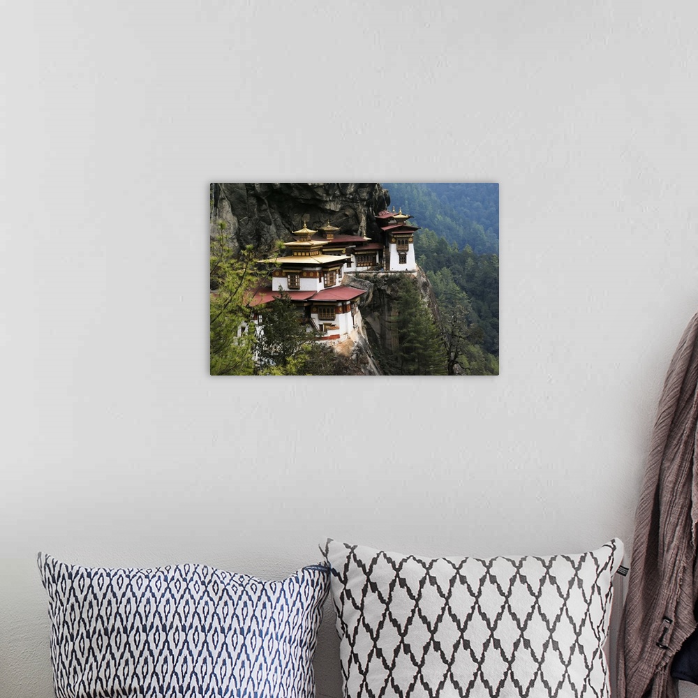 A bohemian room featuring Taktsang Lhakhang, known as The Tiger's Nest, is a monastery clinging to a vertical granite cliff...