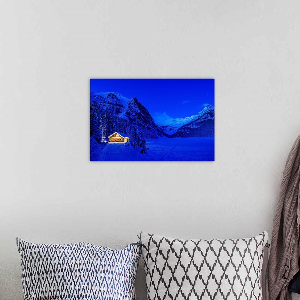 A bohemian room featuring The blue hour at Lake Louise in winter in Banff National Park.