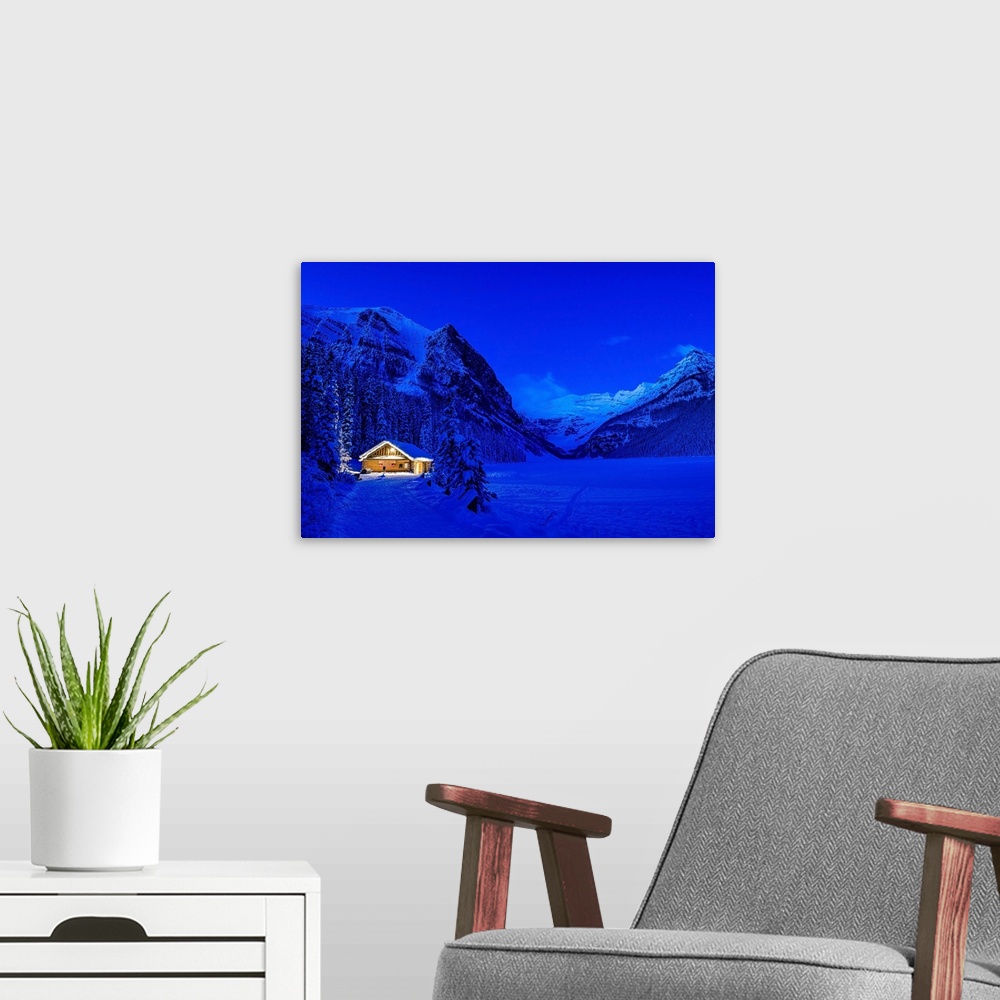 A modern room featuring The blue hour at Lake Louise in winter in Banff National Park.