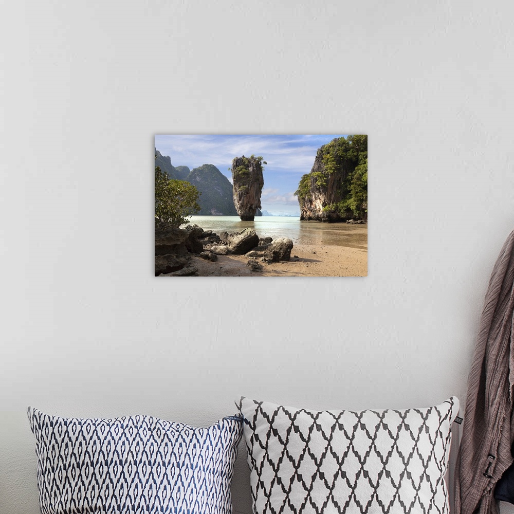 A bohemian room featuring The famous Ko Tapu rock on Khao Phing Kan Island in Thailand.